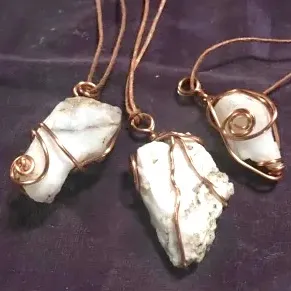 copper wrapped quartz pendants